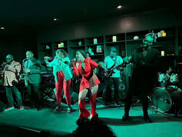 The Fuzz Band performing on stage.