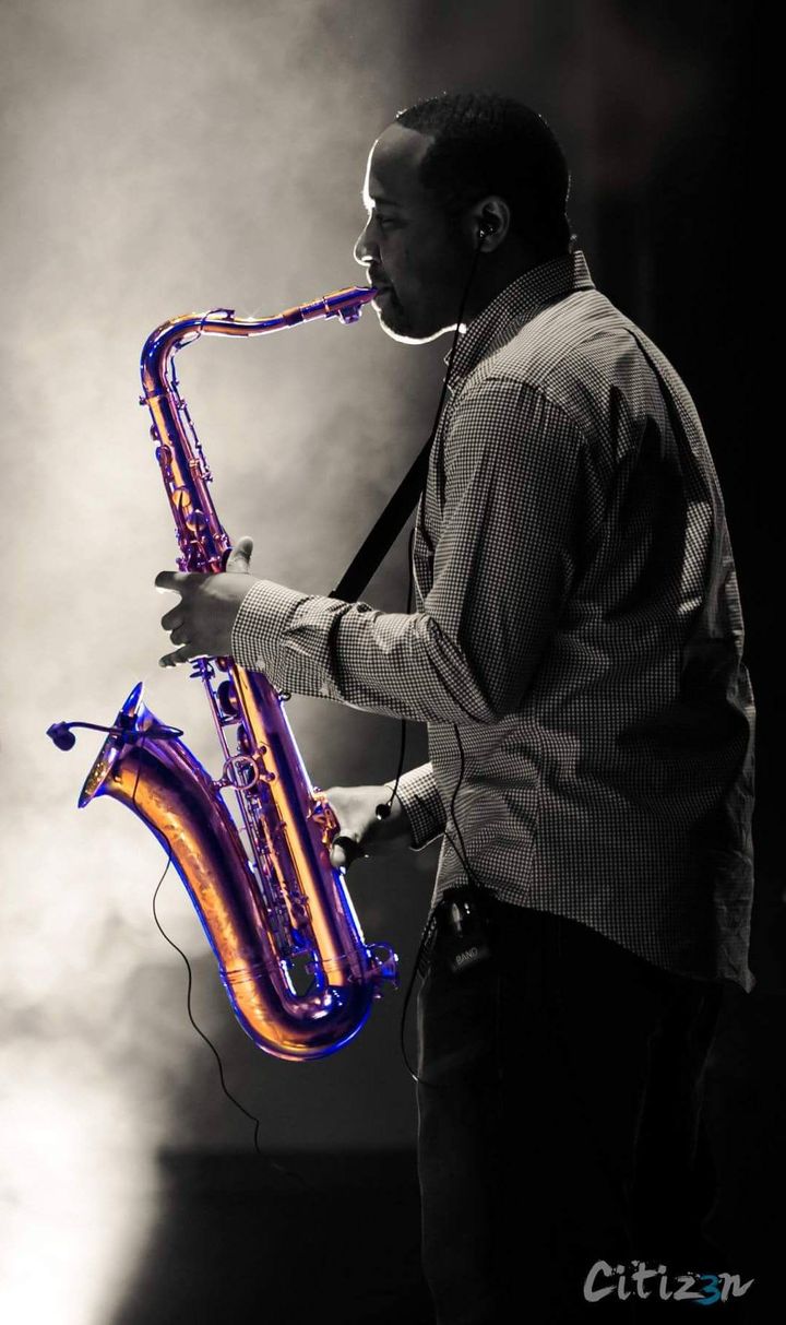 A Fuzz Band horn player.