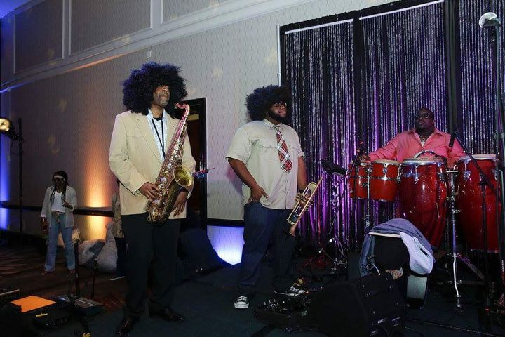 The Fuzz Band performing on stage.
