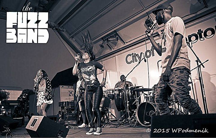 The Fuzz Band performing on stage.