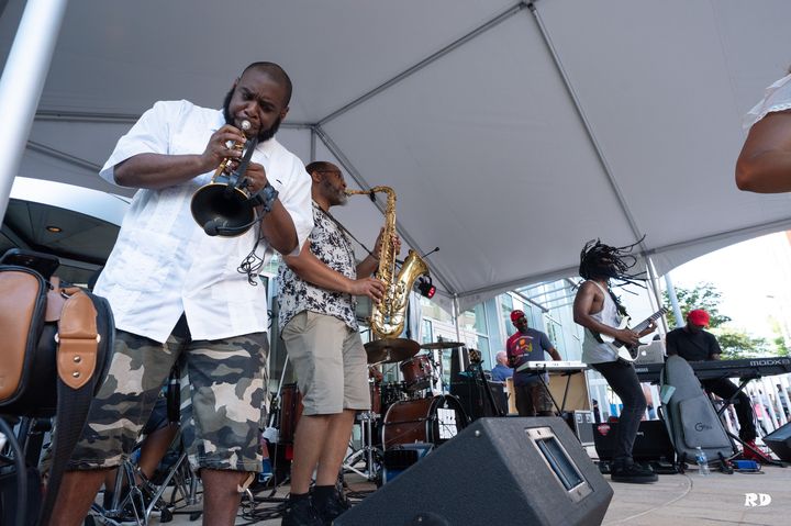 The Fuzz Band performing on stage.